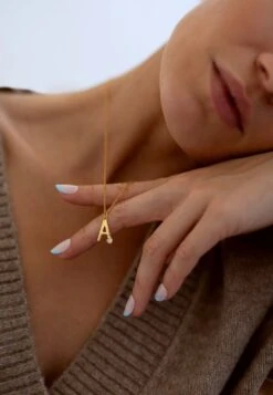 San Saru COLLAR SHURUAATEE CHAPADO EN ORO